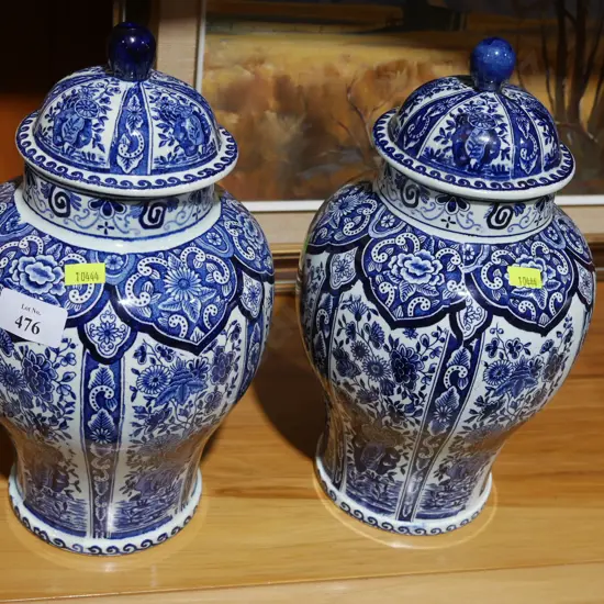 2 Delfts blue and white lidded jars