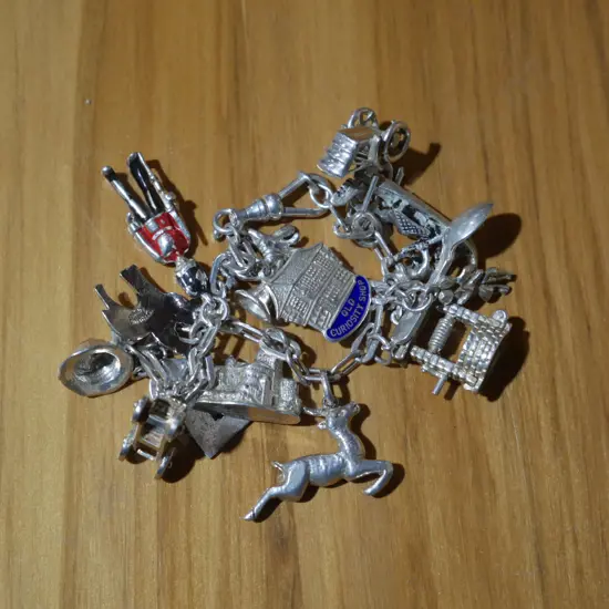 Sterling silver charm bracelet, 42 gram