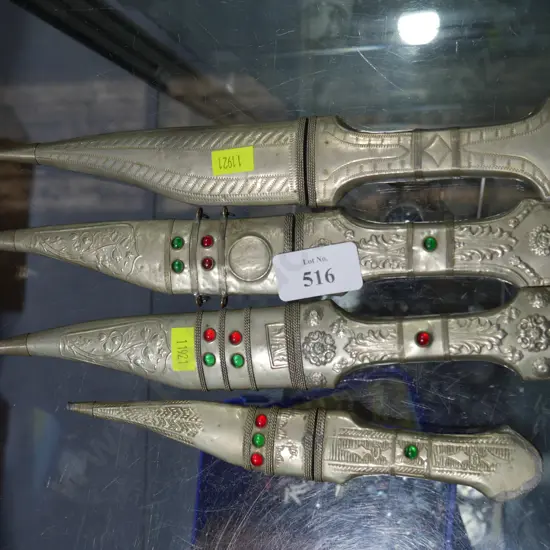 Set of four tribal knives