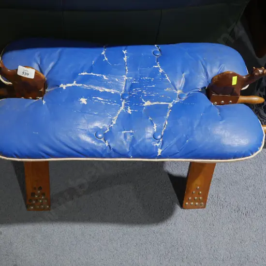 Camel saddle stool