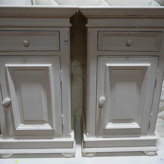 Pair of white bedsides