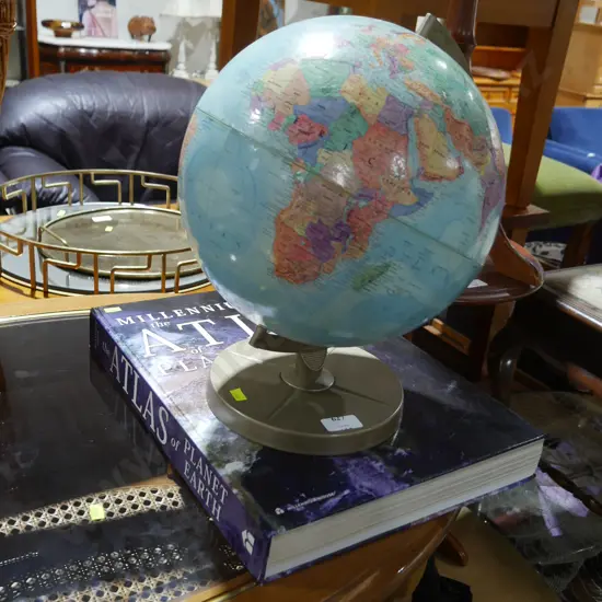 Atlas book and globe