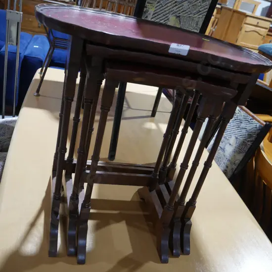 Leather topped nest of tables
