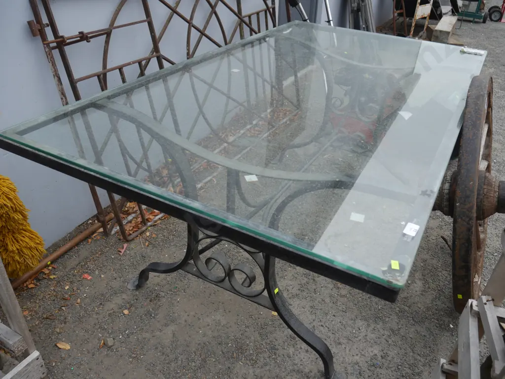 Outdoor glass top table w cast iron base Image 1++