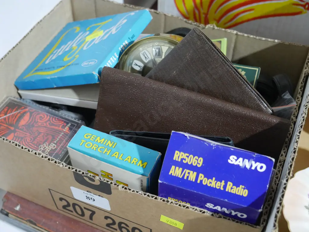 Sanyo pocket radio, brass alarm clock, other sundries Image 1++