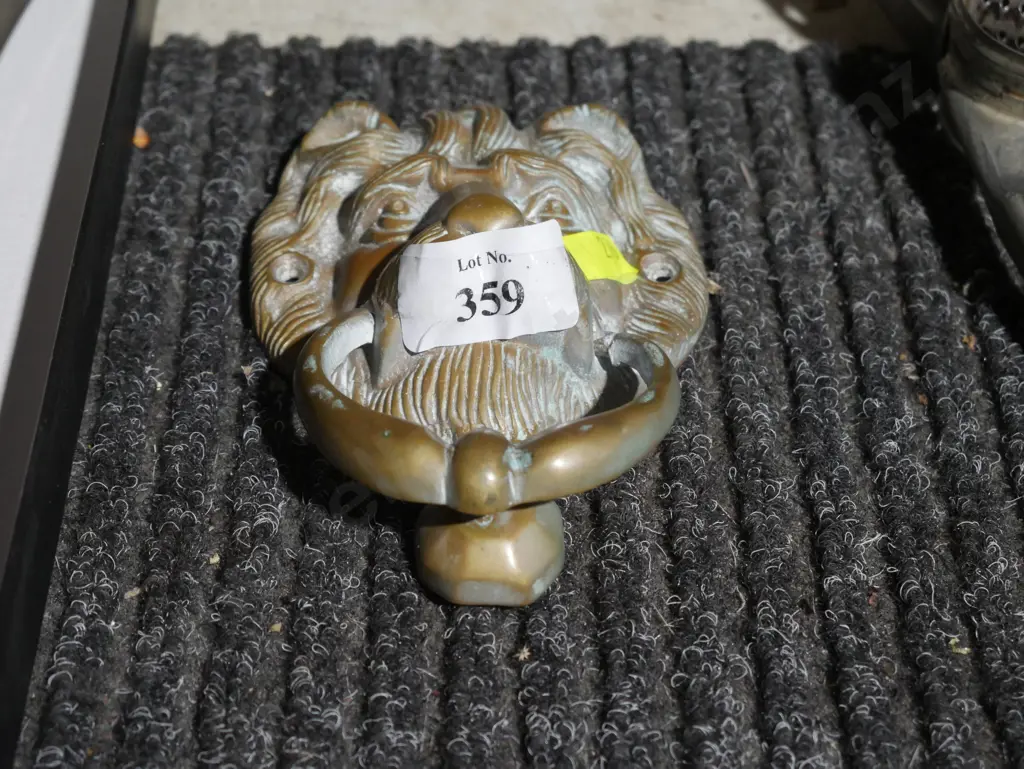 Brass lion head door knocker Image 1++