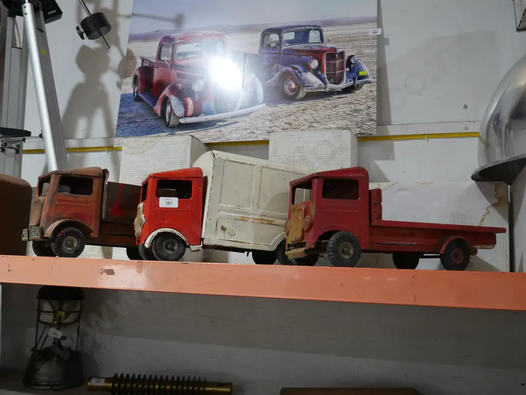 3 tin trucks Image 1++