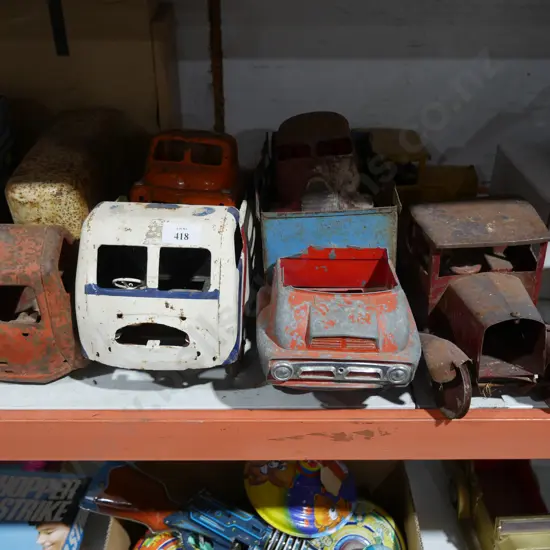 7 tin trucks