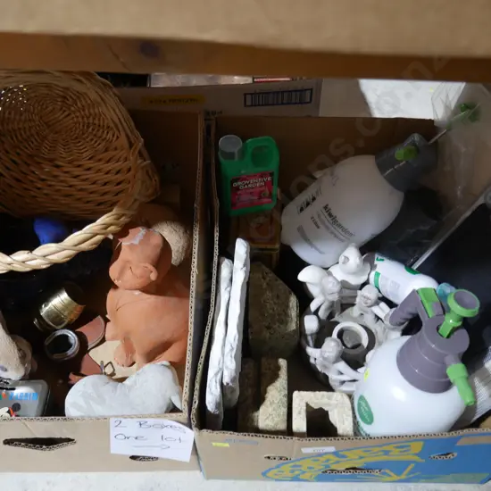 2 boxes of garden sprays, figurines etc