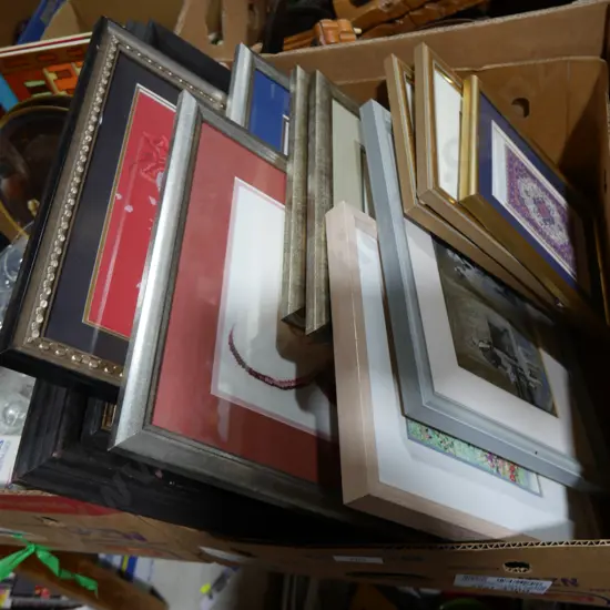 Box of assorted artworks