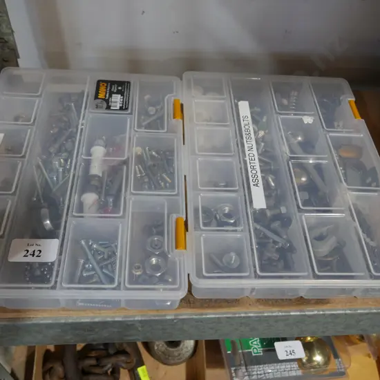 Two containers of nuts and bolts etc