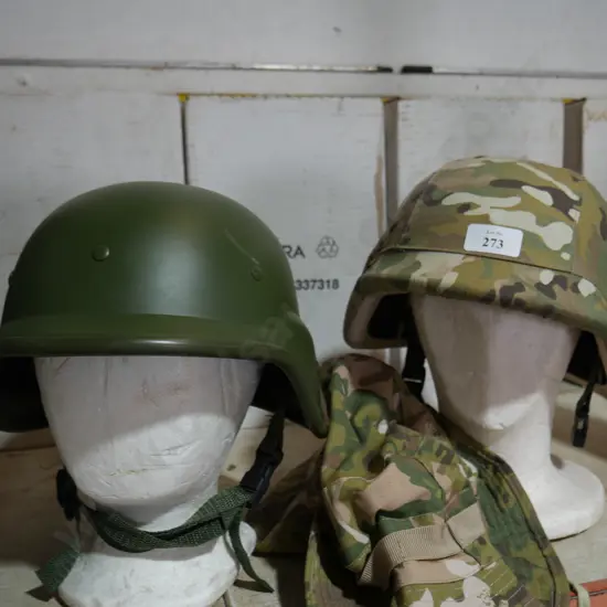 2 military helmets