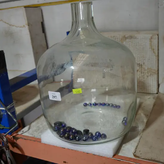 Glass bottle and marbles