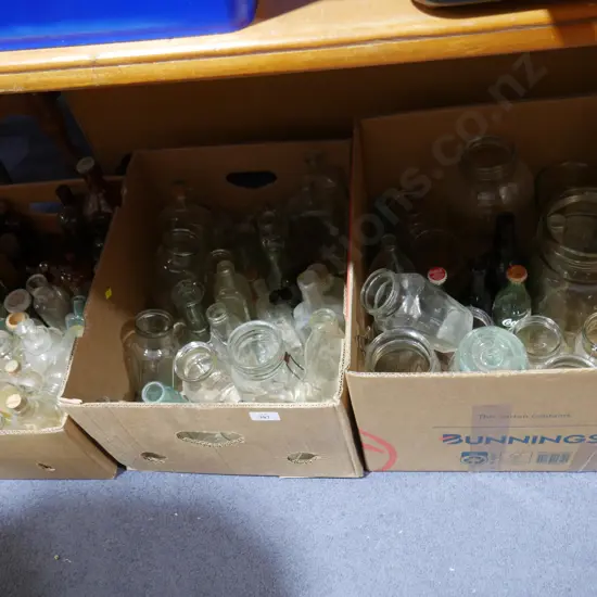 3 boxes of glass bottles