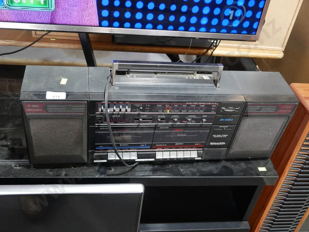 Sharp portable stereo Image 1++