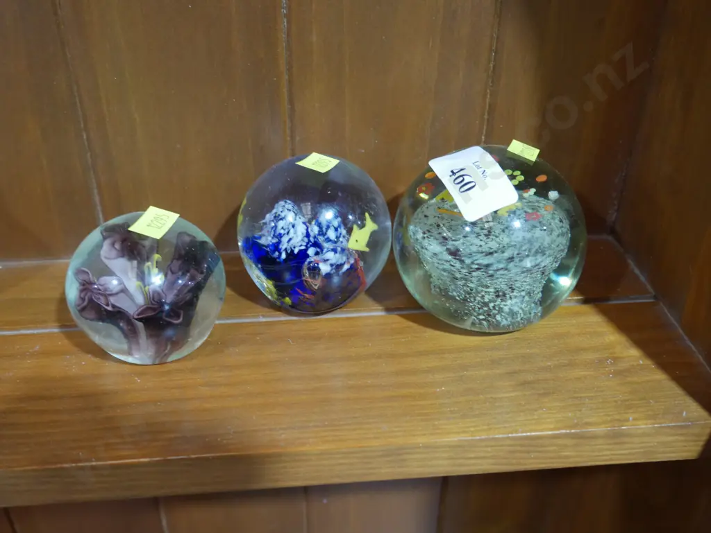 Three glass paper weights Image 1++
