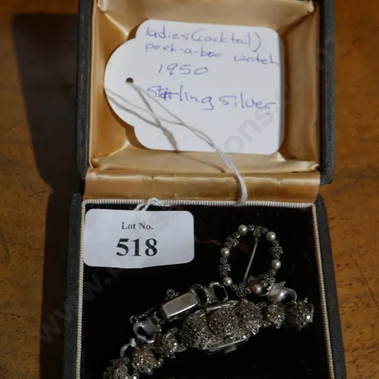 Sterling silver peekaboo watch
