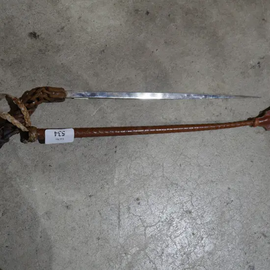 Riding crop with concealed spike