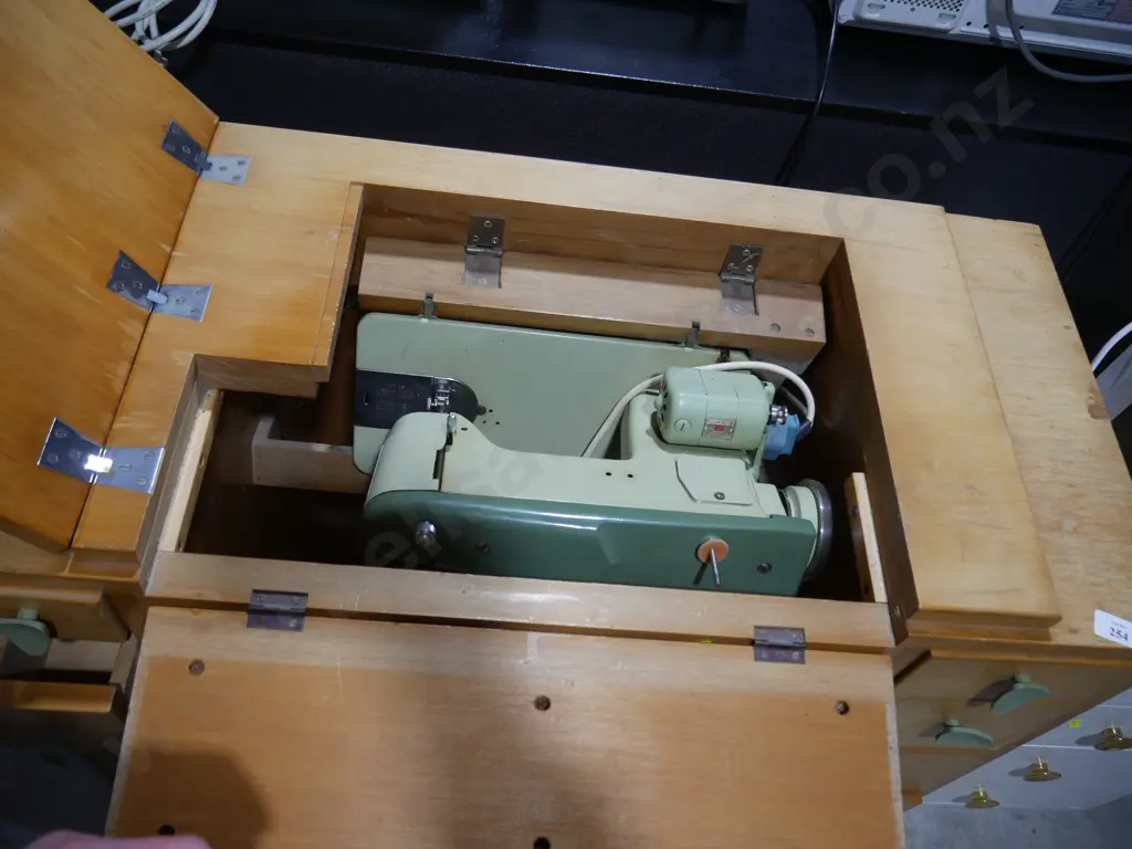 Sewing machine in cabinet Image 1++