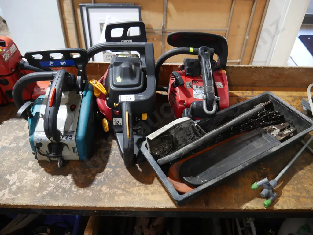 3 chainsaws and parts Image 1++
