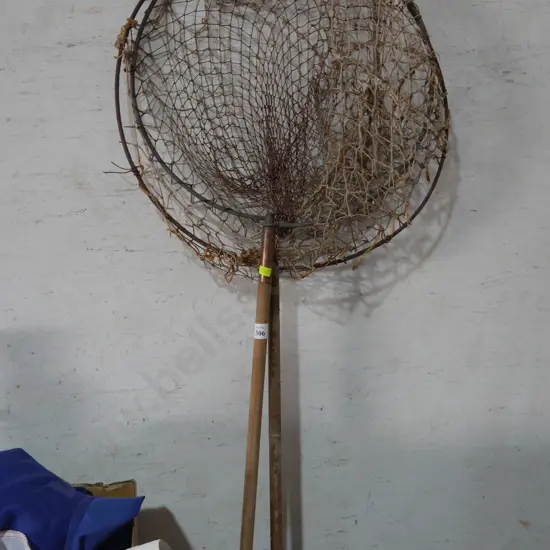 Two vintage fishing nets