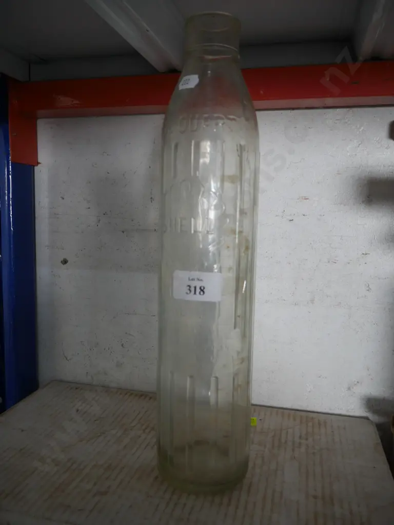 Glass shell oil bottle Image 1++
