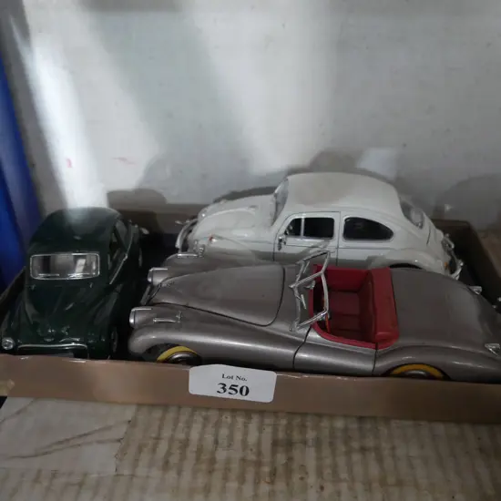 Three model cars