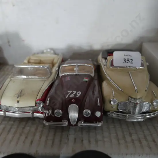 Three model cars