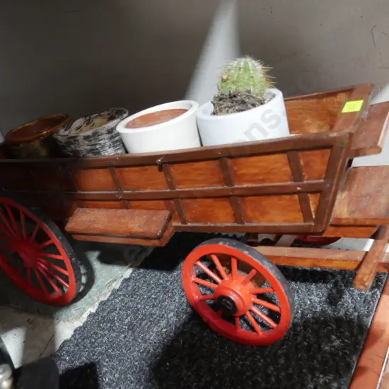 Wagon and cactus plant