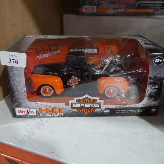 Model pick up truck and bike