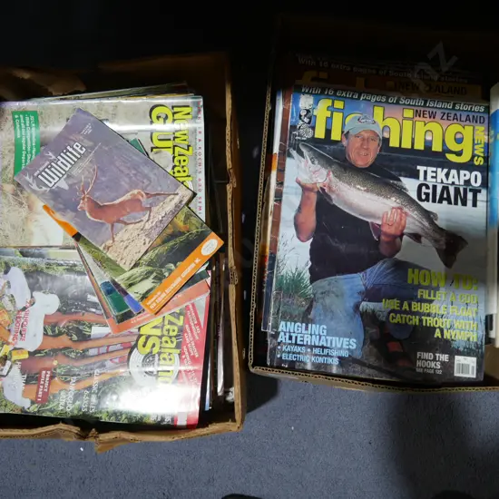 Two boxes of magazines