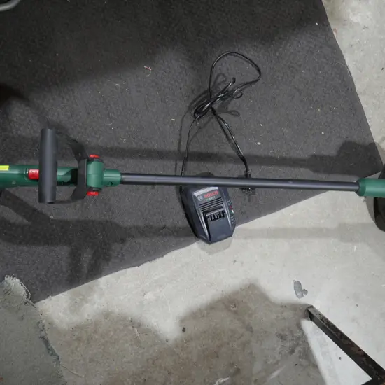 Cordless line trimmer and charger