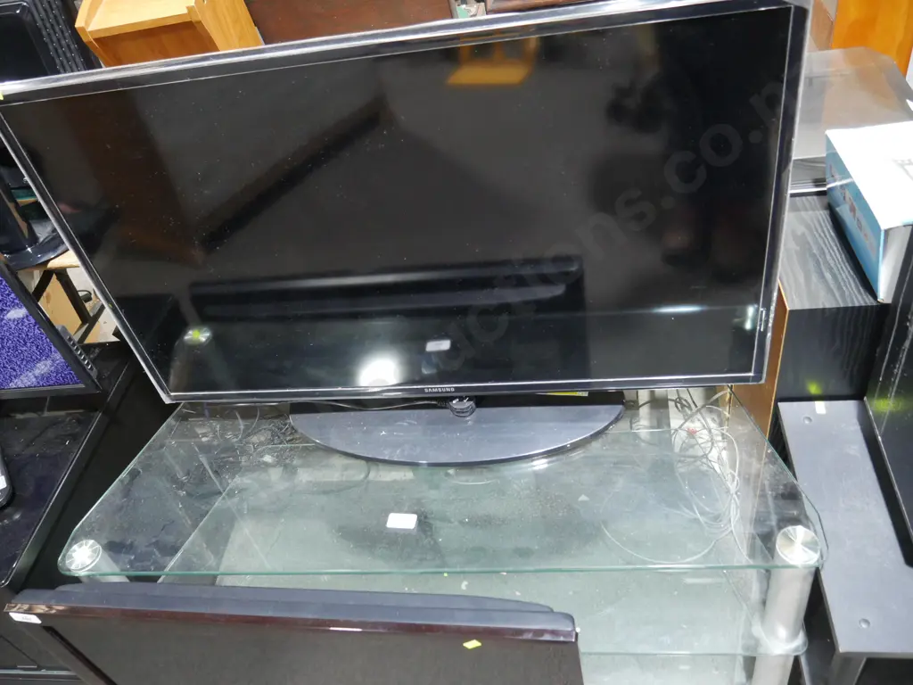 Samsung TV and glass TV unit Image 1++