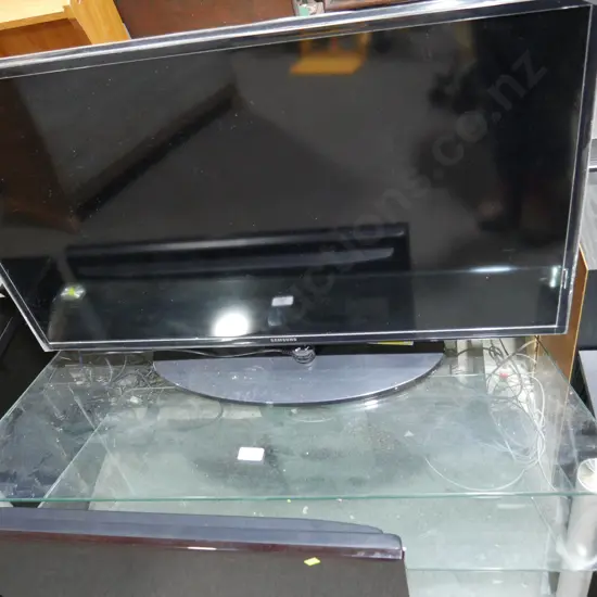 Samsung TV and glass TV unit
