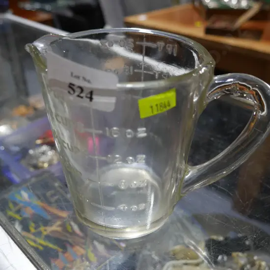 Glass measuring jug