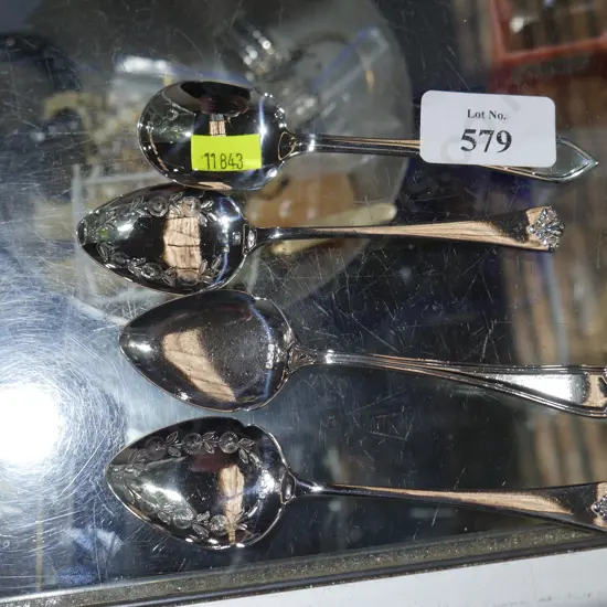 4 silver spoons