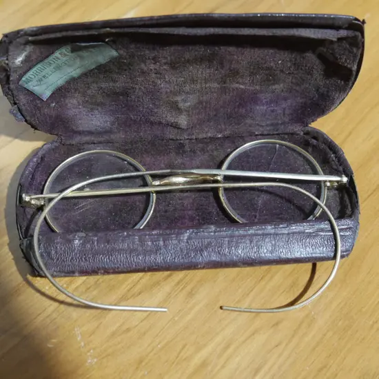9 carat gold rimmed vintage glasses