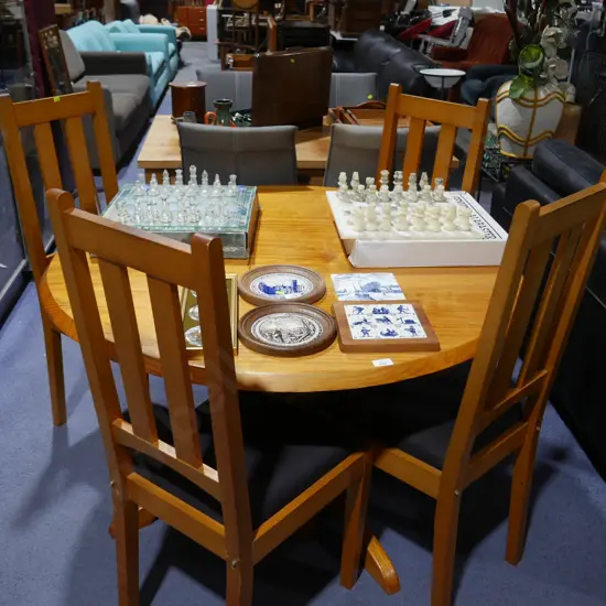 Round dining table and four chairs
