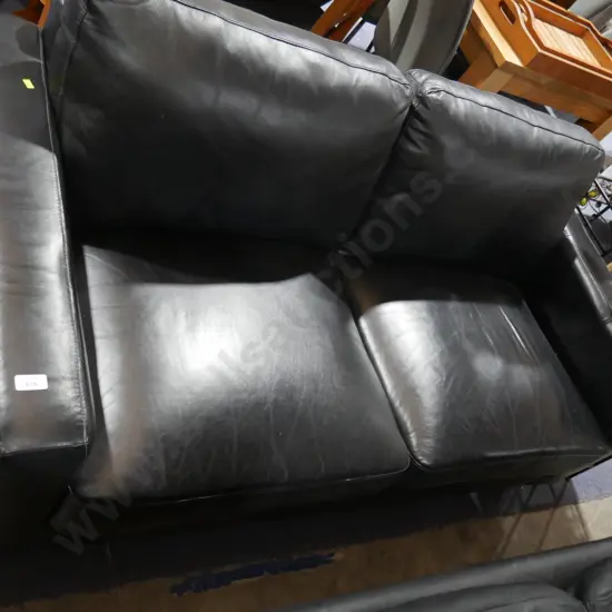 Black leather 2-seater couch