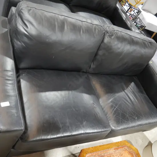 Black leather 2-seater couch