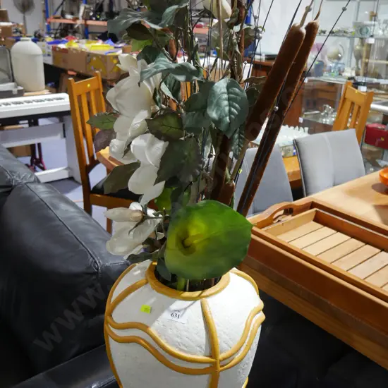 Artificial plant in vase
