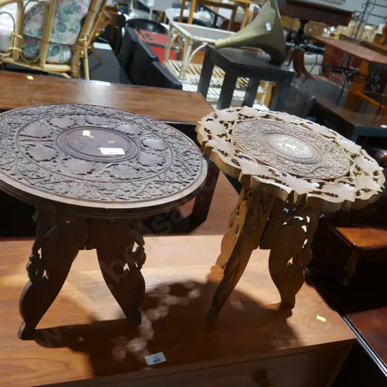 2 carved tables