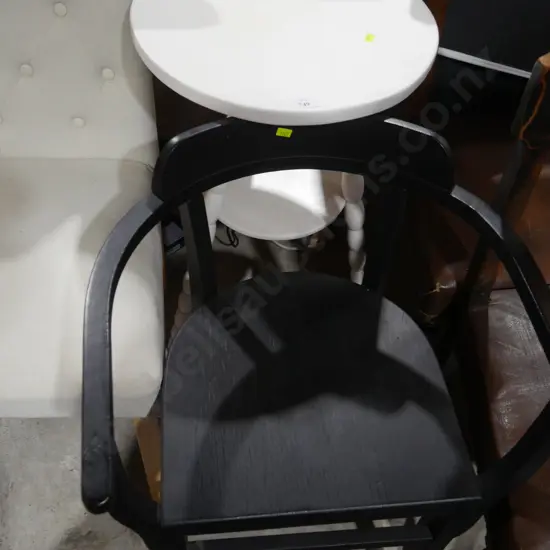 2 tier plant table and black elbow chair
