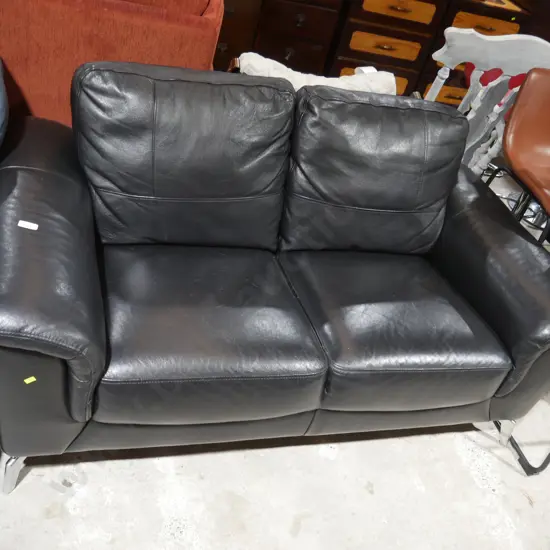 Black leather two seater couch