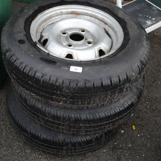 3 car tyres and rims