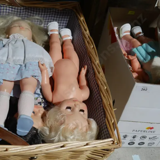 Picnic basket and box of dolls etc