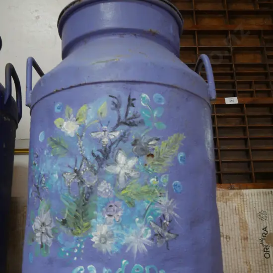 Blue painted milk can