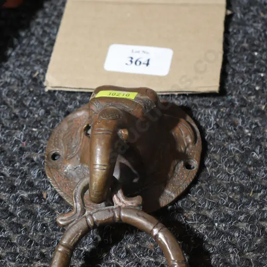 Metal elephant door knocker