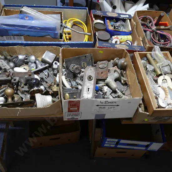 4 boxes of assorted door handles etc