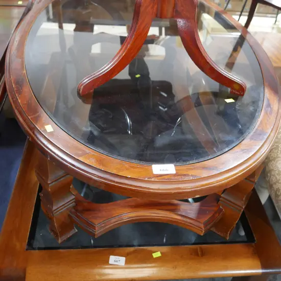 Glass top coffee table oval